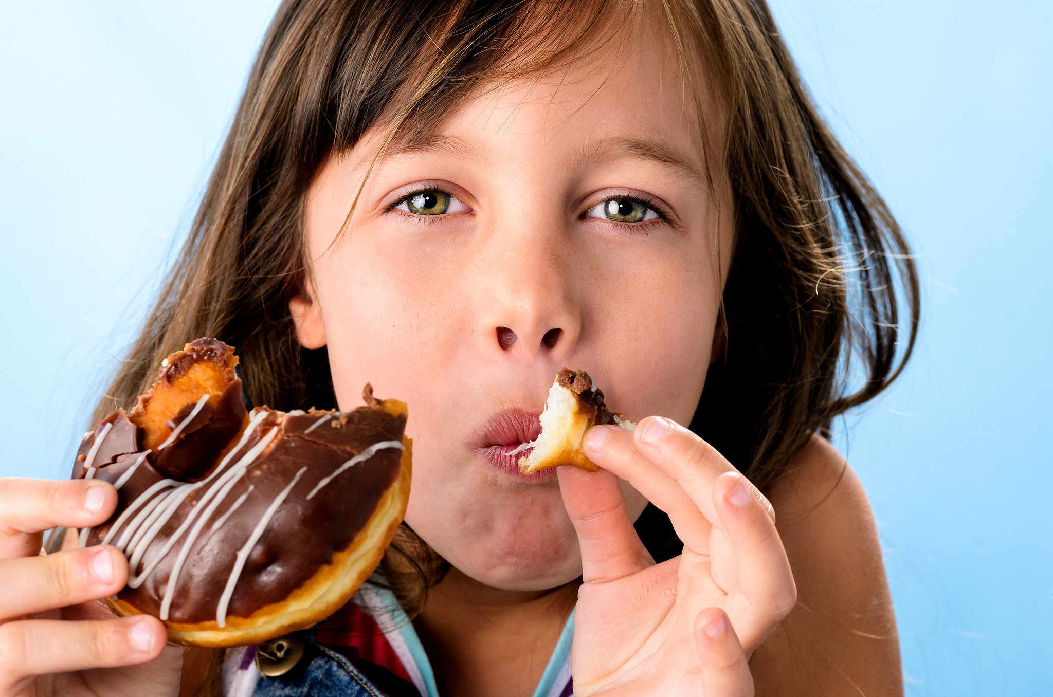 girl eating donuts